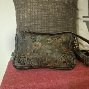 latico embossed floral crossbody bag in dark brown with multicolor accents